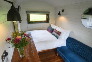 Double Bed and Sofa in the Pheasant Shepherds Hut