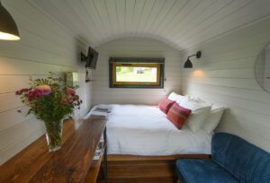 The Lapwing Shepherds Hut Double Bed and Chair