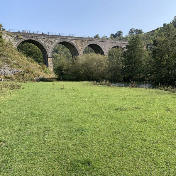 arches-of-monsal-head-viaduct Looking up at the elegant Victorian arches of monsal head viaduct from the valley below