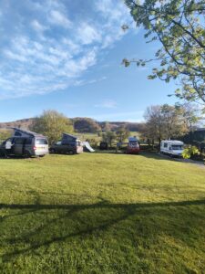 Camper vans and tent at Derbyshire Hills Campsite