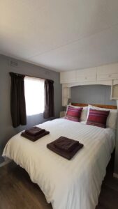 Double bed in static caravan at Derbyshire Hills